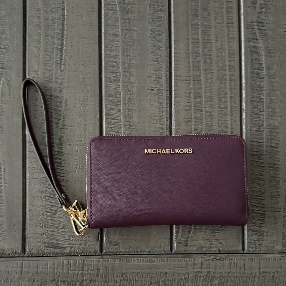 NWOT Michael Kors Plum Leather Wristlet with Gold Accents